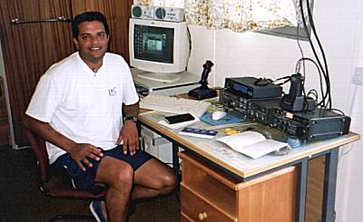 Johnny, ZD8KW at his shack at Travellers Hill