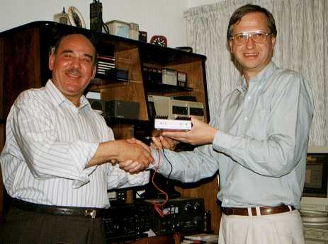 Chris, G3WOS presenting Ezzat, SU1ER with the 100 watt amplifier.